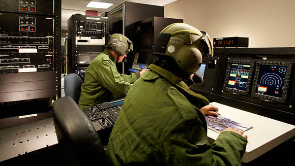 Airforce operators at training console