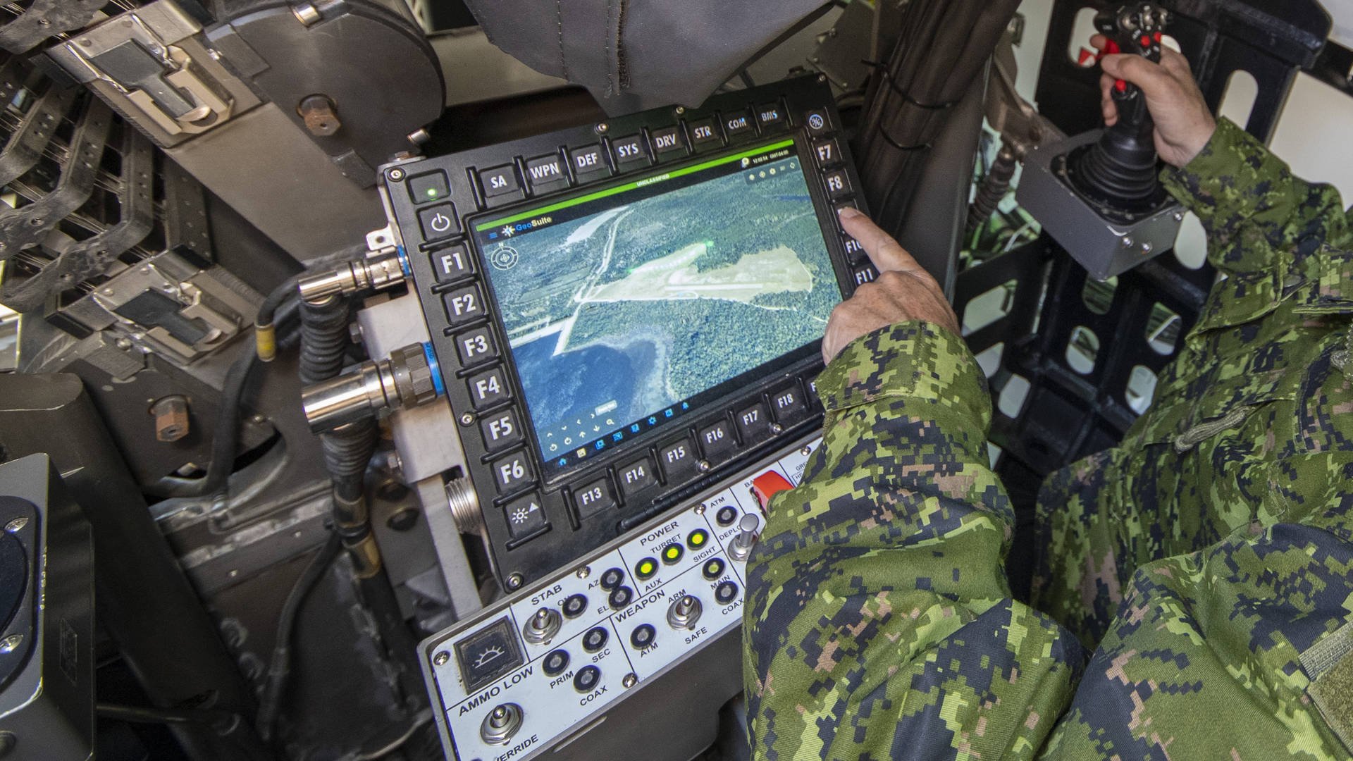 Canadian Soldier pressing button on smart display