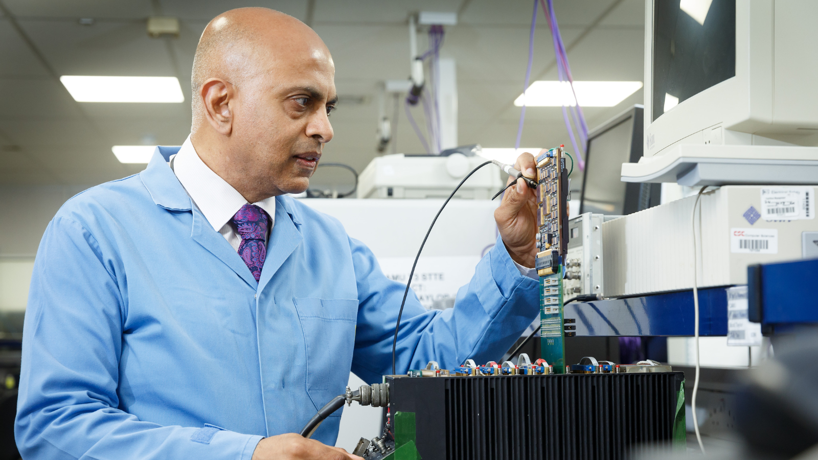 Colleague working with technology