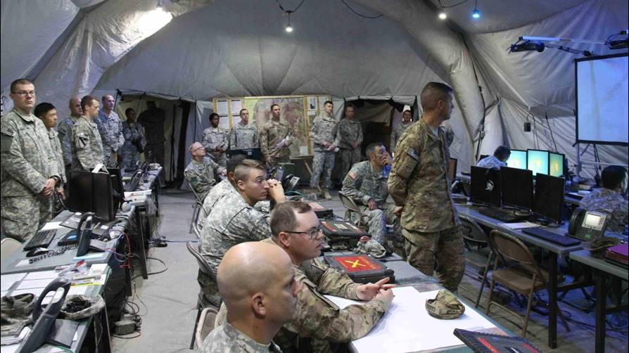 Tent headquarters with multiple large screens