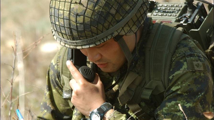 Soldier Using Communications Equipment